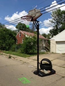 Esrati hangs nets on rims