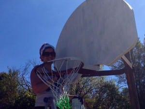 Photo of Tabatha Muntzinger painting backboards