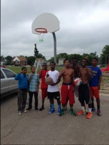 Esrati hangs nets so kids can play