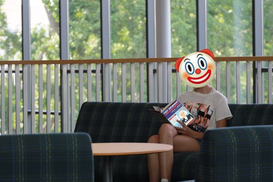 Woman reading a book in the public library