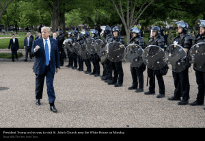 Trump and his blackshirted police escort to church