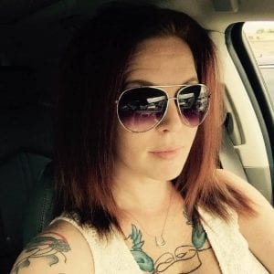 Jennifer Lynn Woodward chest tattoos