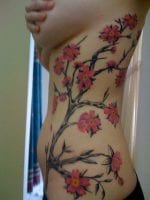 Photo from Facebook of Jennifer Woodward's tattoos